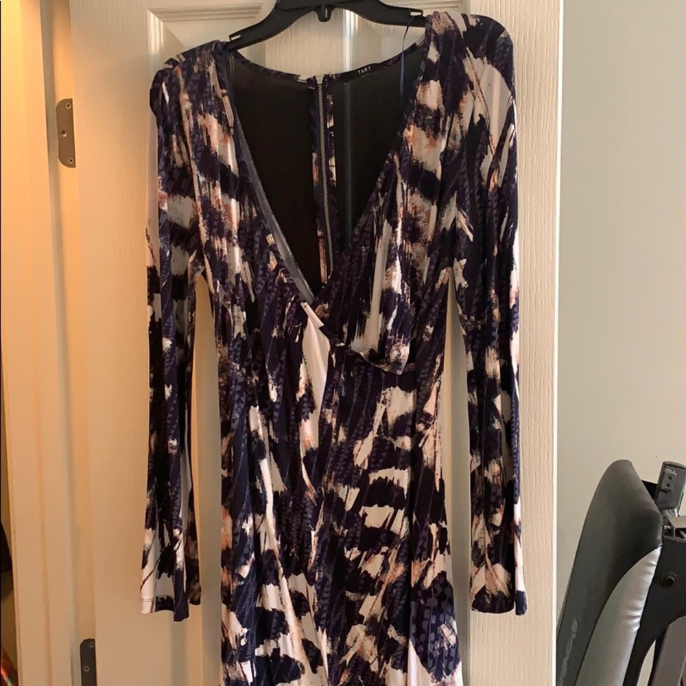 Sexy- low cut and very flattering.